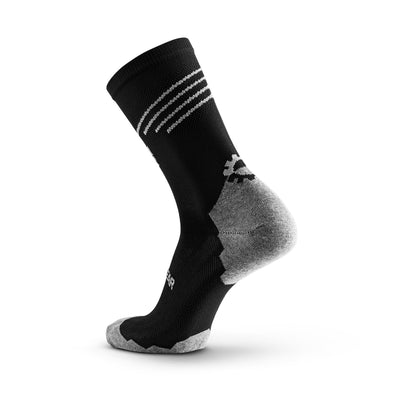 Mid-length; reaches mid-calf or lower socks